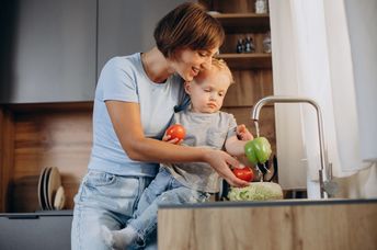 Washing vegetables before cooking.