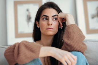 Woman lost in thought.