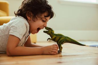A TikTok trend has people gobbling up leafy greens dinosaur style.