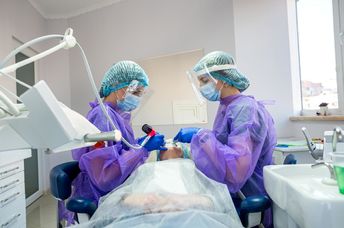 A patient being examined in a dental office.