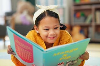 Reading at the library.