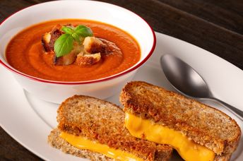 Nothing says comfort more than tomato soup and a vegan grilled cheese sandwich.