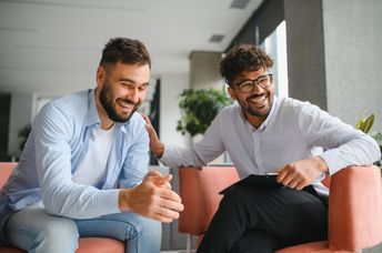 A therapist supports his patient.