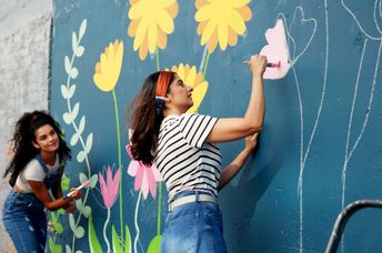 Painting a mural at a school.