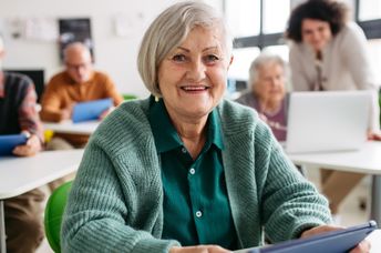 Seniors learning through hands-on activities.