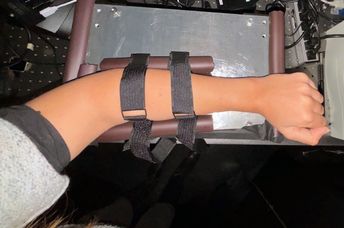 A doctor checks a patient’s blood sugar level.