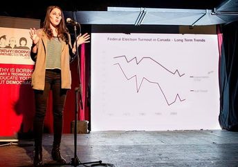 Caro Loutfi speaks to crowd about elections