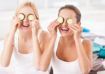 Girls making organic spa treatments at home