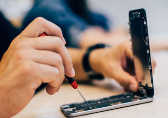 Fixing a smartphone is an encouraging achievement that is as rewarding to the teens as it is to the broken device's owner. (Shutterstock)