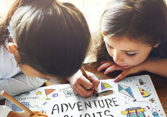 Girl Scouts getting ready for camp.