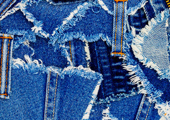 Denim scraps showing repurposed old clothes