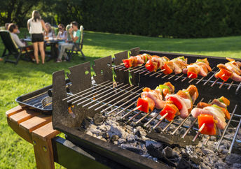 Having a BBQ on a warm summer day.