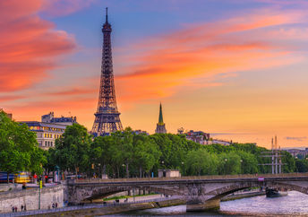 Sunset across the River Seine with the Eiffel Tower, a view enjoyed from Colette Maze’s apartment.