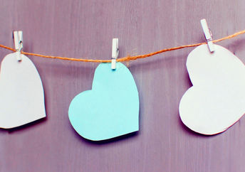 Paper hearts signifying kindness in the community