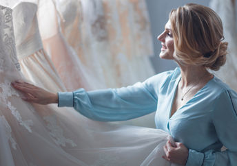 Bride shopping for her wedding gown.