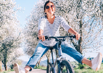 Happy and thriving  woman out in nature.