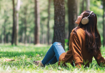 A woman with headphones.