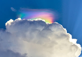 A rare cloud phenomenon called Iridescent Cloud also known as Fire Rainbow.
