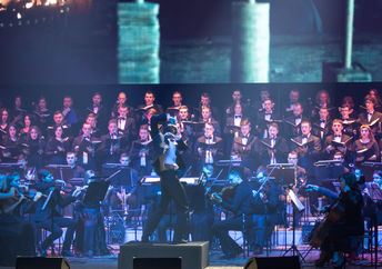 Choral group performs on stage