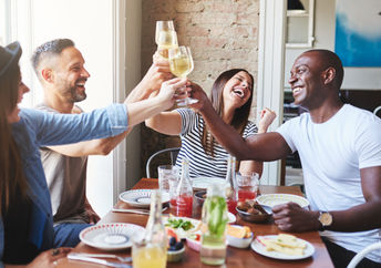 group of people eating a meal together