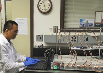 NASA researchers working on the solid state battery.