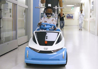 Young hospital, patient riding n the Shogo.