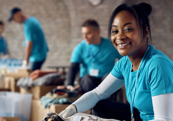 Volunteering at a humanitarian aid center for Giving Tuesday.