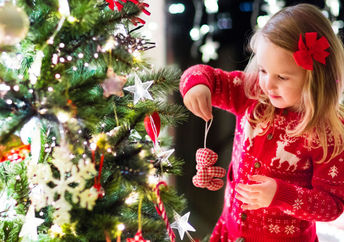 Trimming the tree for Christmas.