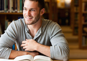 Joyful and focused millennial employee.