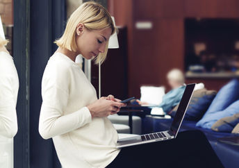 Working at the coffee shop.