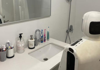 Gary is cleaning a bathroom.