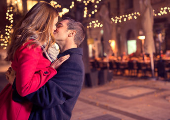 Young couple kissing.