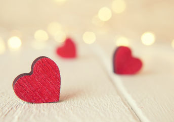 Hearts on a wooden table.