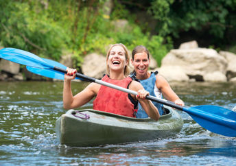 Kayaking on a river.