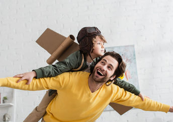 Dad inspiring daughter.