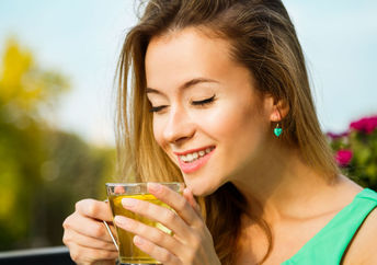 Enjoying a cup of tea outdoors.