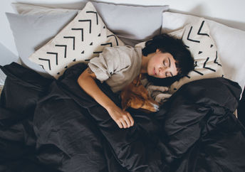 Woman getting a good night's sleep.