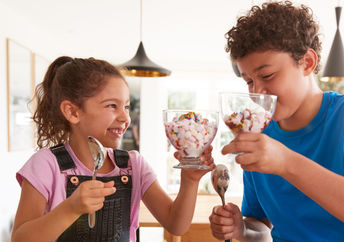 Enjoying a bowl of homemade vegan ice cream.
