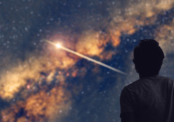 Man stargazing on vacation.