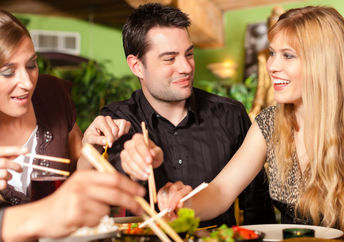 Eating with chopsticks that can be upcycled into new items.
