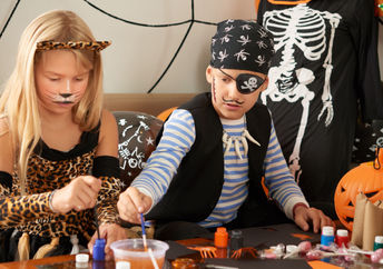 Woman in DIY Halloween makeup and costume.