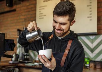 Barista making coffee.