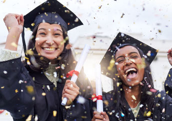 Two college graduates.