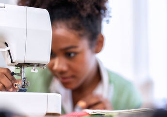 Tweaking upcycled apparel.