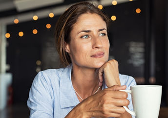 Woman deep in thought.