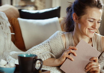 a woman embracing hygge.