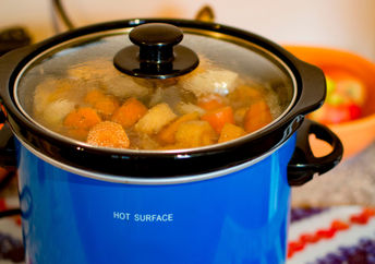 Cooking a stew in a slow cooker.
