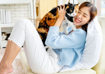 Woman with her pet cat.