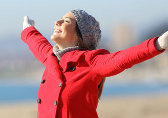 Happy motivated woman ready to start her day.