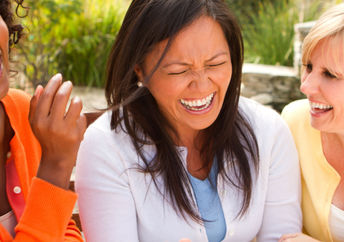 Group of friends laughing.